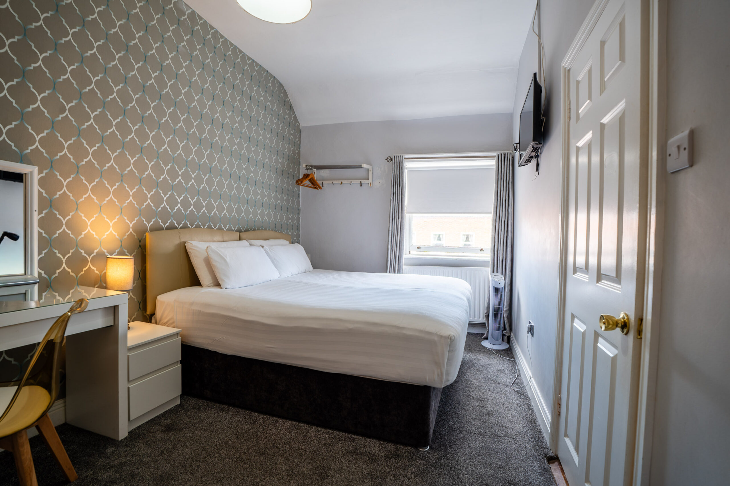 Modern Double bedroom at Clifden Guesthouse Dublin with king-size bed and luxury linens